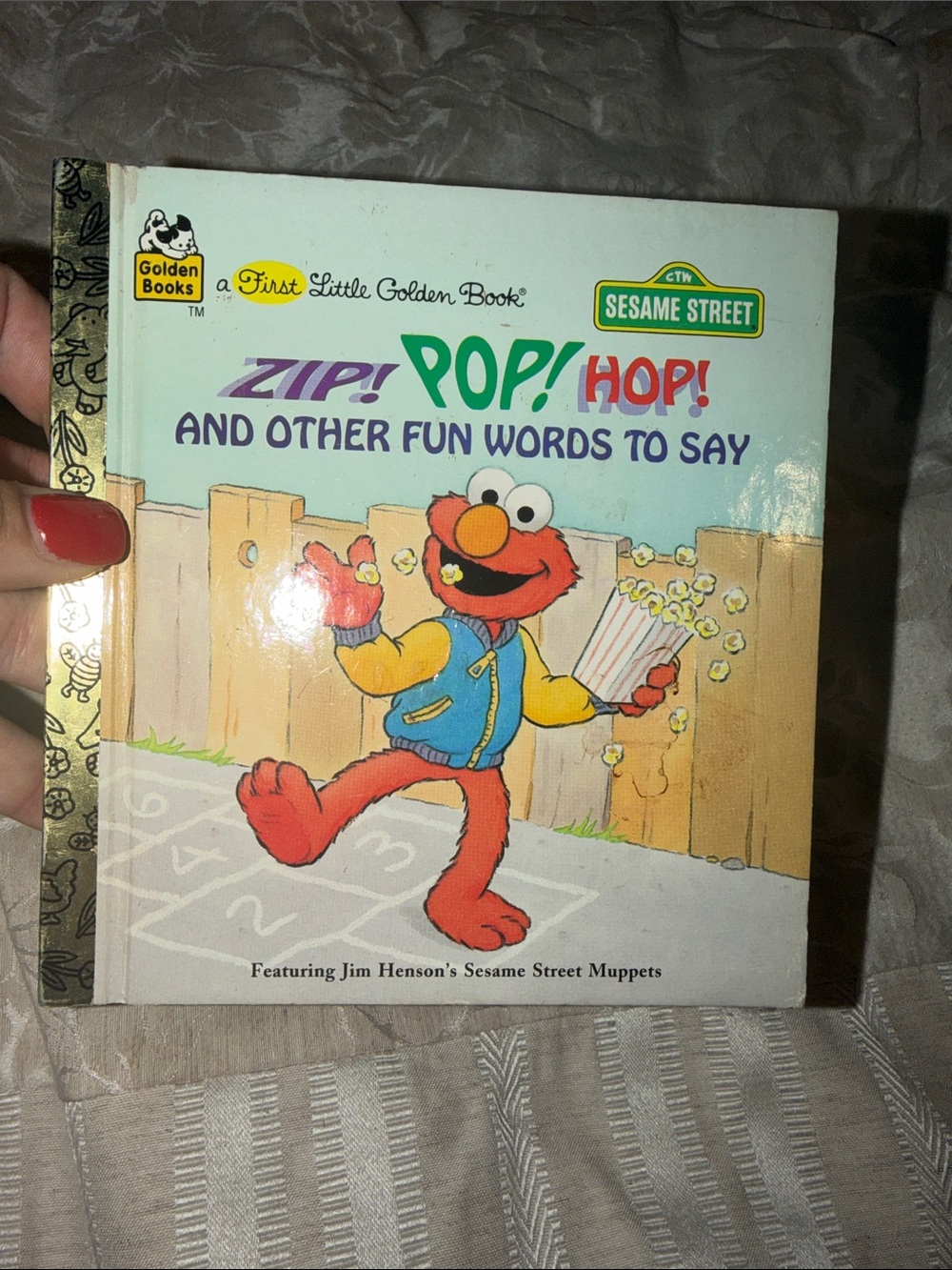Sesame Street Zip! Pop! Hop! Elmo Board Book - Blue & Red